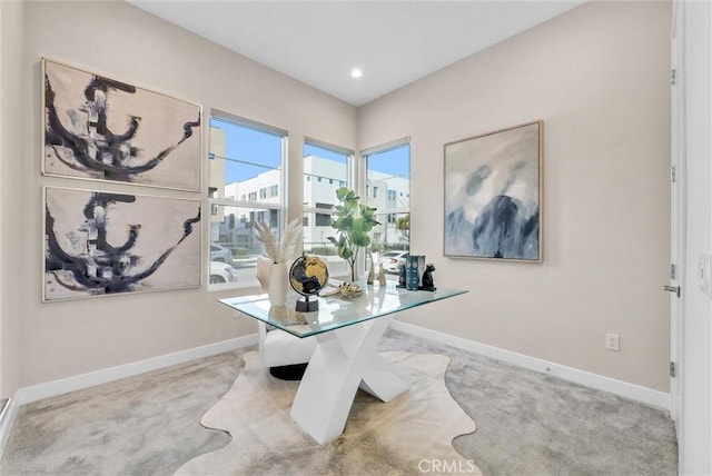 interior space featuring recessed lighting and baseboards