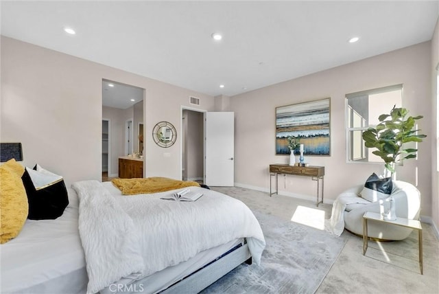 bedroom featuring light carpet, visible vents, baseboards, connected bathroom, and recessed lighting