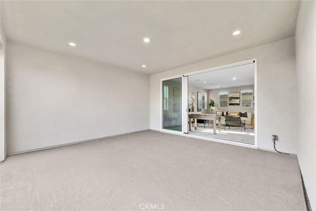 unfurnished room featuring carpet floors and recessed lighting