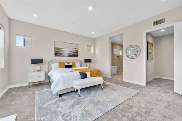 bedroom with connected bathroom, recessed lighting, carpet floors, visible vents, and baseboards