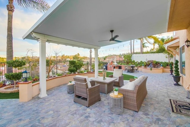 view of patio featuring outdoor lounge area and ceiling fan