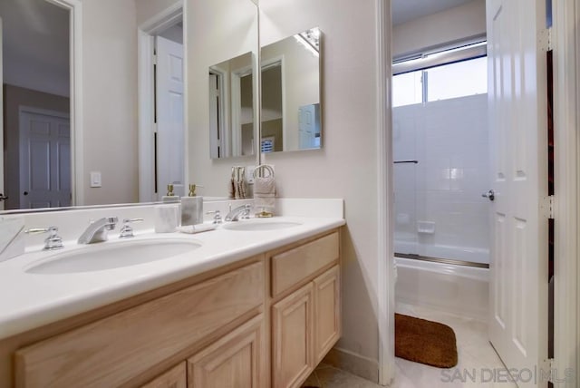 full bathroom featuring enclosed tub / shower combo, toilet, tile patterned floors, and vanity