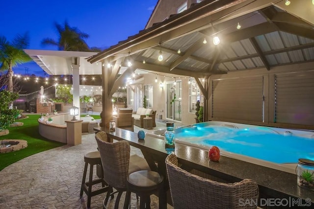 view of pool featuring a gazebo, a patio area, and outdoor lounge area