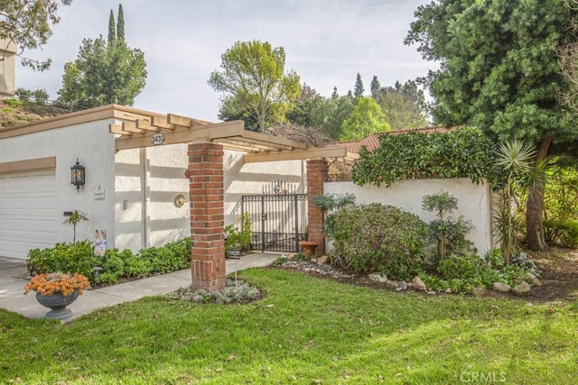 exterior space with a garage and a front yard