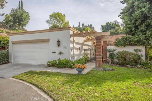 mediterranean / spanish-style house with a garage and a front yard