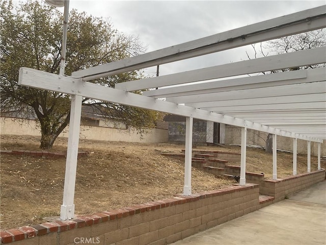 exterior space with a pergola