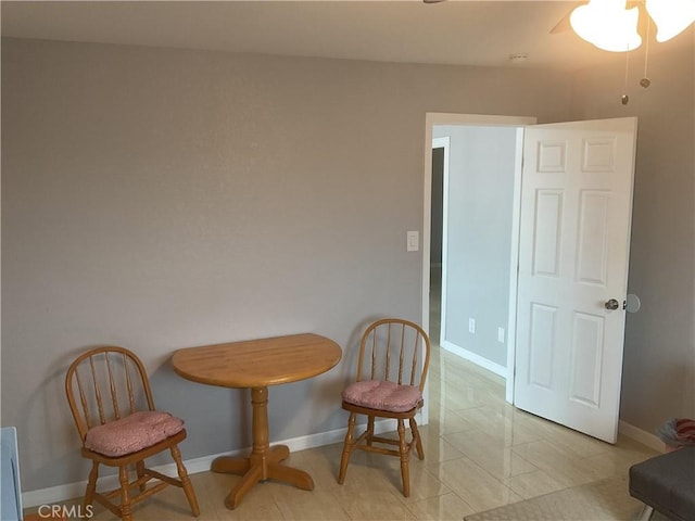 sitting room with light tile patterned floors