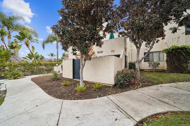 view of property exterior with stucco siding