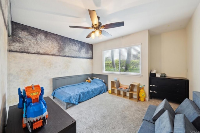 carpeted bedroom with a ceiling fan