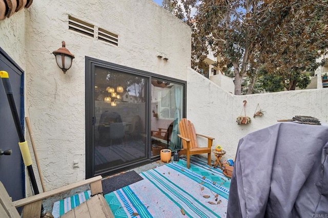 wooden deck featuring a grill and fence