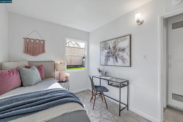 bedroom featuring light hardwood / wood-style flooring