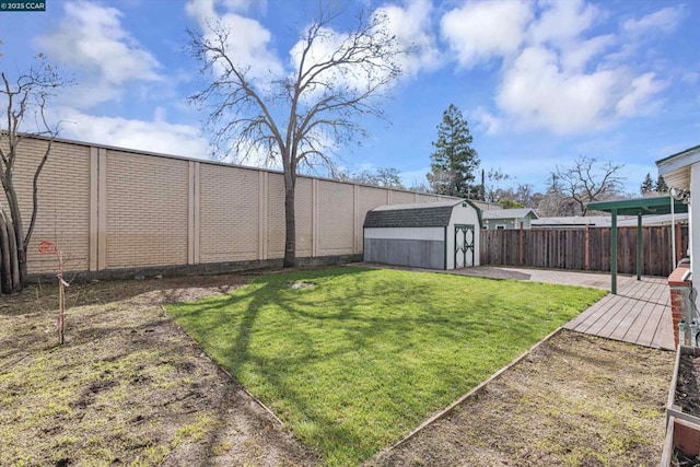 view of yard featuring a shed and a patio