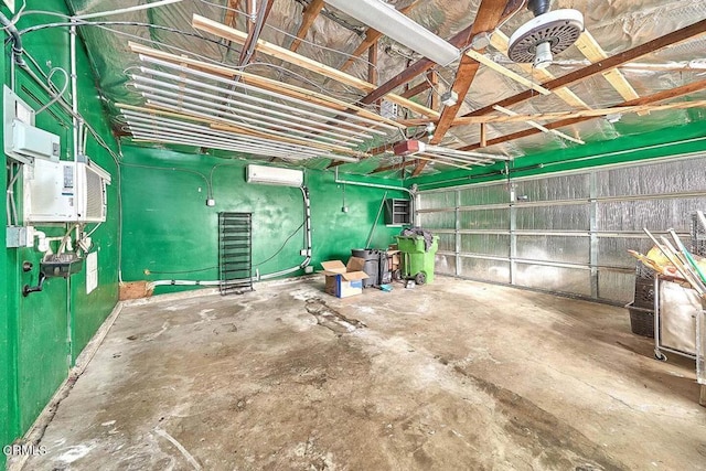 garage featuring an AC wall unit