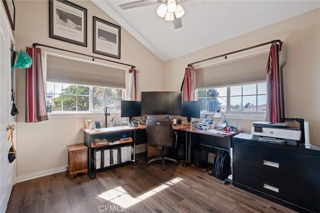 office space featuring a ceiling fan, vaulted ceiling, baseboards, and wood finished floors