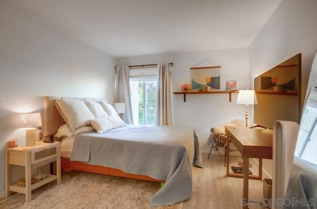 bedroom with light hardwood / wood-style floors