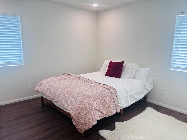 bedroom featuring dark hardwood / wood-style floors