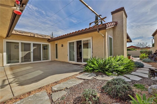 back of house featuring a patio area