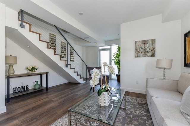 living room featuring dark hardwood / wood-style floors