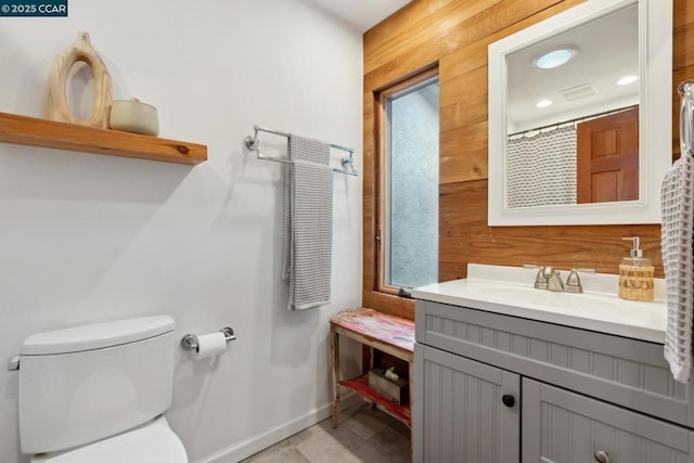 bathroom with vanity and toilet