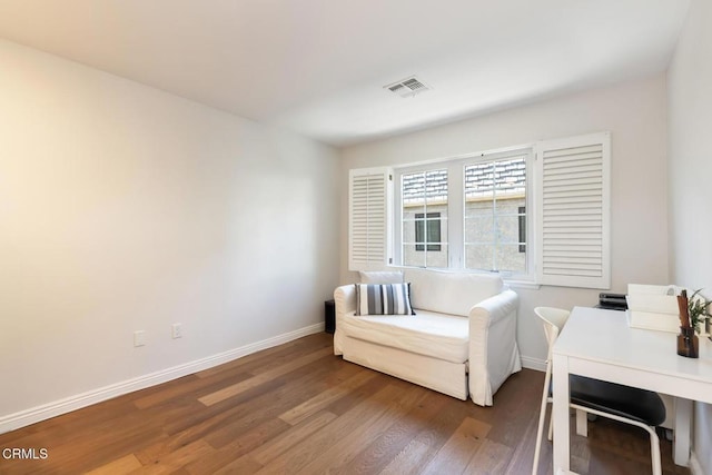 living area with dark wood-type flooring