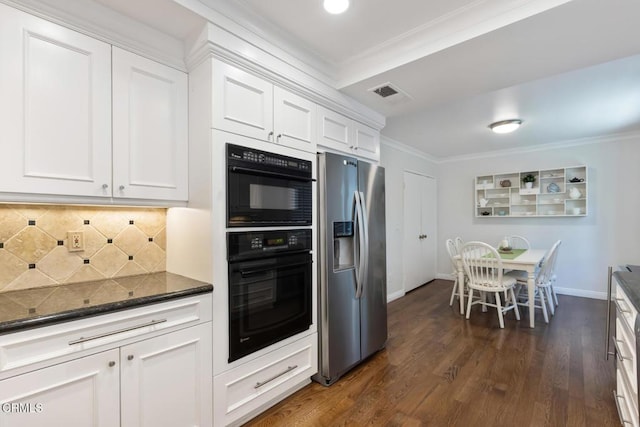 kitchen with stainless steel refrigerator with ice dispenser, ornamental molding, and white cabinets