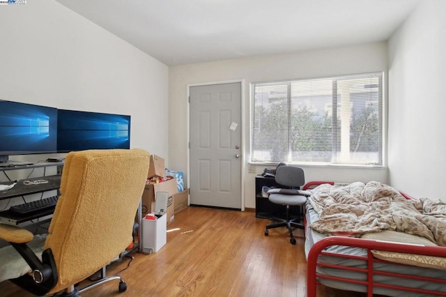 office space with hardwood / wood-style floors