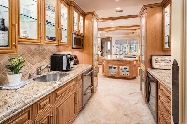 7756 St Andrews Rd, Rancho Santa Fe, CA 92067 - kitchen featuring light stone countertops, tasteful backsplash, visible vents, a sink, and beverage cooler