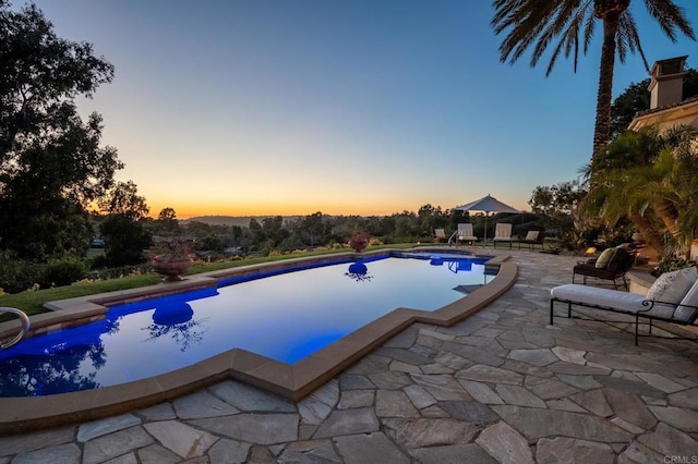 7756 St Andrews Rd, Rancho Santa Fe, CA 92067 - pool at dusk with a patio and an outdoor pool