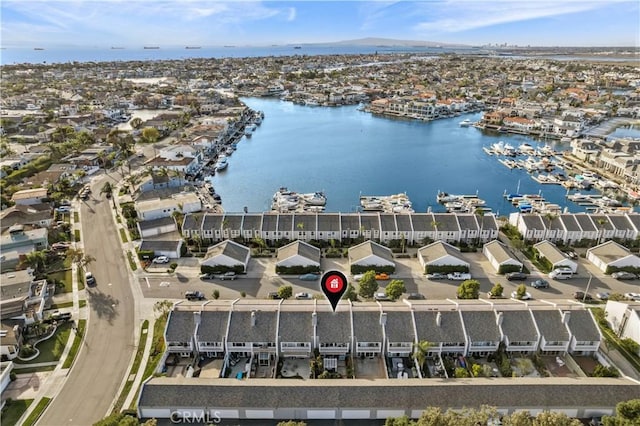 aerial view featuring a residential view and a water view