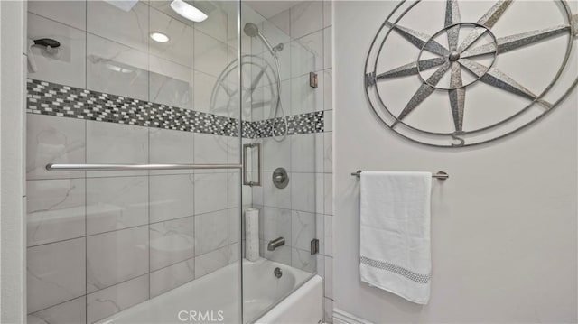 bathroom with tiled shower / bath combo