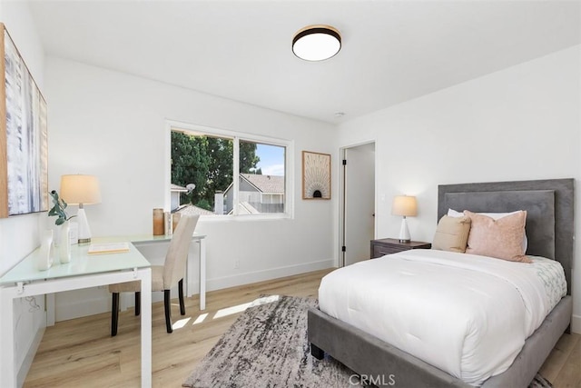 bedroom featuring light hardwood / wood-style floors