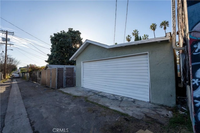 detached garage with fence