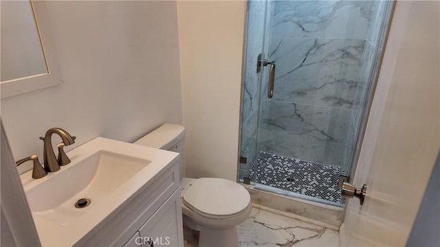 bathroom with toilet, marble finish floor, a marble finish shower, and vanity