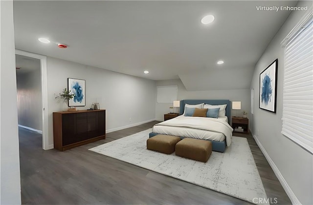 bedroom featuring baseboards, dark wood-type flooring, and recessed lighting