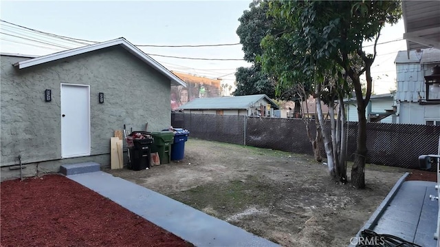 view of yard featuring fence