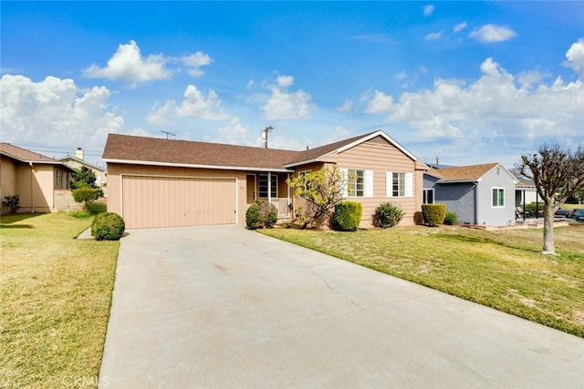 ranch-style home with a garage and a front yard