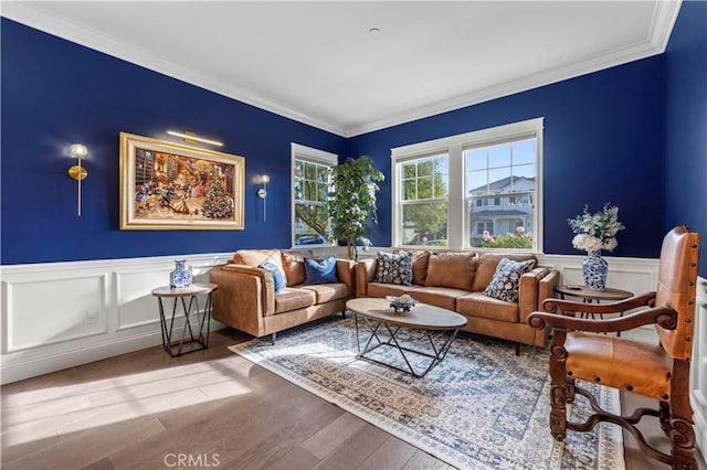 living room featuring wood-type flooring and crown molding