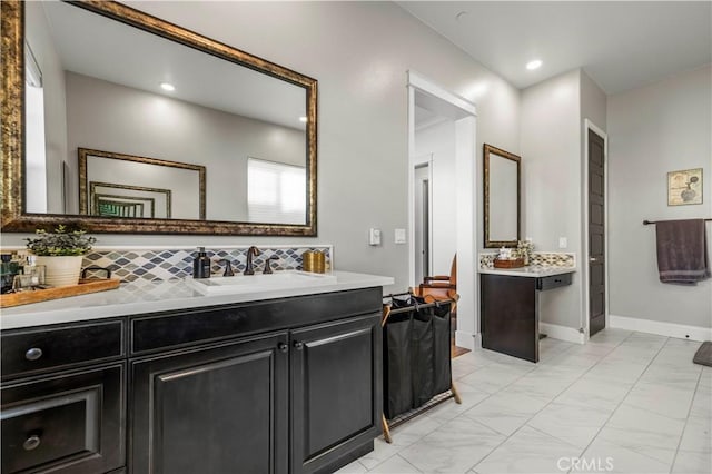 bathroom with vanity and decorative backsplash