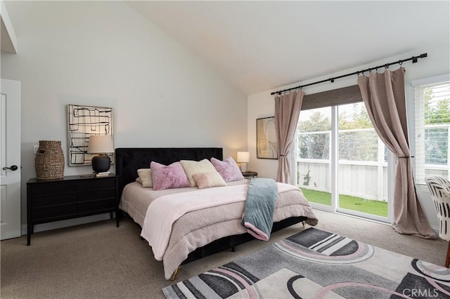 bedroom with carpet flooring, access to exterior, and high vaulted ceiling