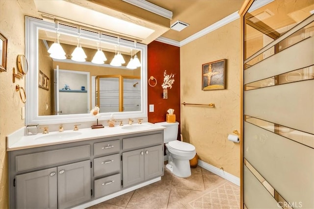 bathroom featuring tile patterned flooring, vanity, an enclosed shower, toilet, and crown molding