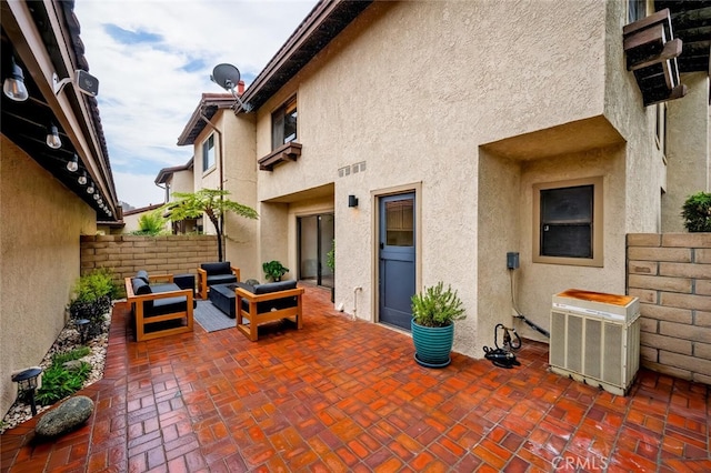 view of patio with an outdoor hangout area and central air condition unit