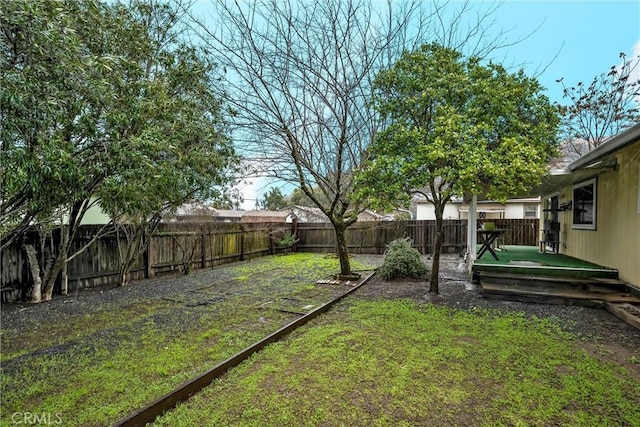 view of yard featuring a deck