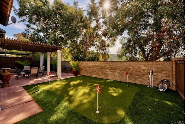 view of yard with a pergola and a patio area