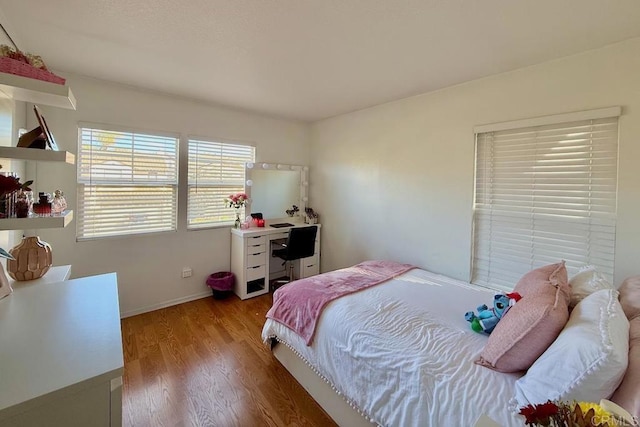 bedroom featuring light hardwood / wood-style floors