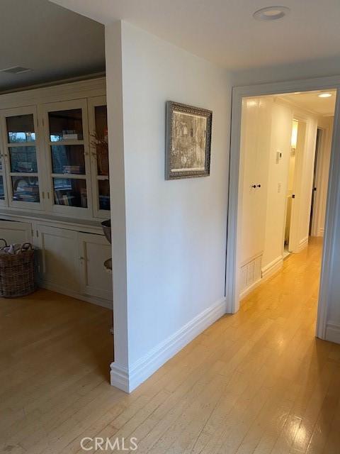 hallway featuring light hardwood / wood-style floors