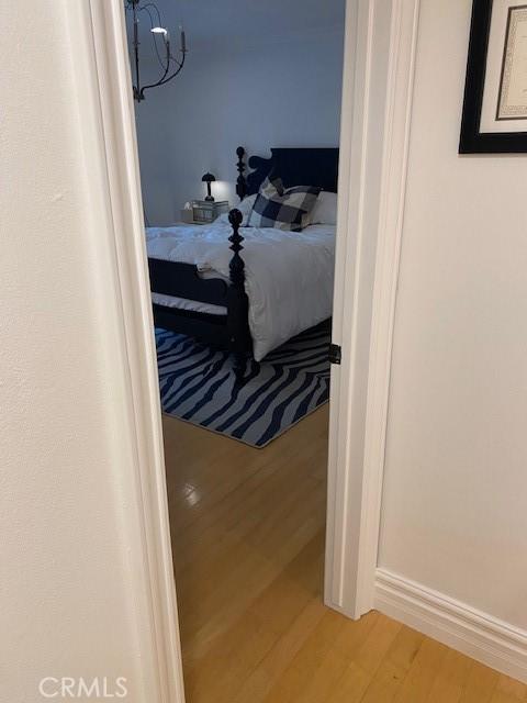 bedroom featuring hardwood / wood-style flooring