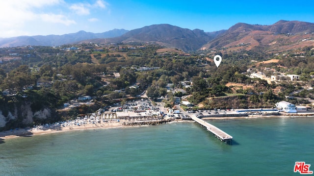 bird's eye view featuring a water and mountain view