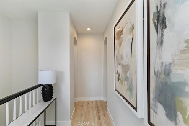 corridor featuring light hardwood / wood-style flooring