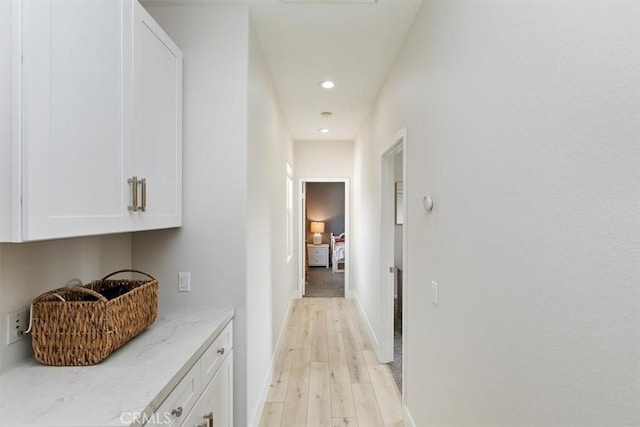 hallway featuring light hardwood / wood-style floors