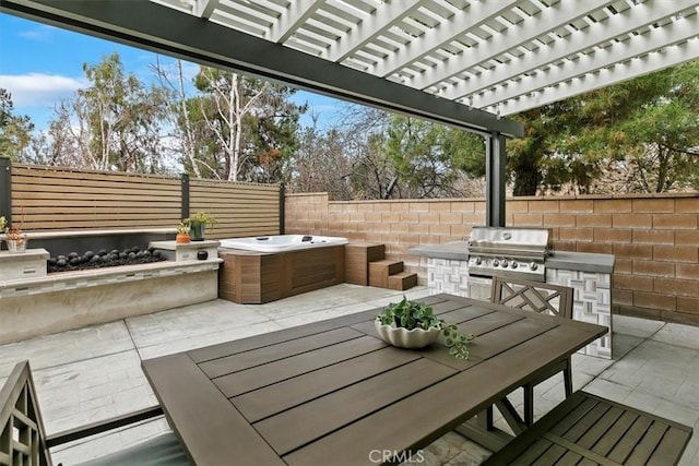 view of patio with grilling area, a hot tub, a pergola, and area for grilling